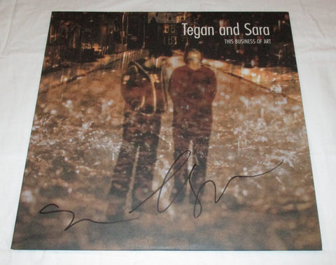 TEGAN AND SARA SIGNED THIS BUSINESS OF ART VINYL RECORD