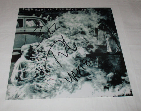 RAGE AGAINST THE MACHINE SIGNED 12X12 PHOTO