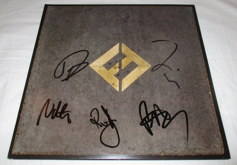 THE FOO FIGHTERS SIGNED CONCRETE AND GOLD VINYL RECORD JSA