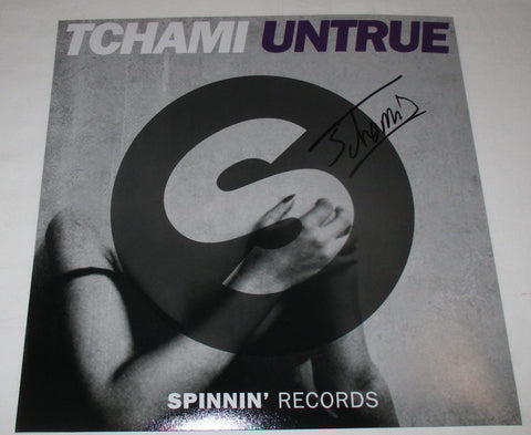 TCHAMI SIGNED UNTRUE 12X12 PHOTO