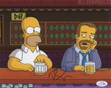 RICKY GERVAIS SIGNED THE SIMPSONS 8X10 PHOTO ACOA