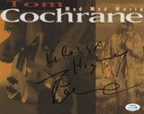 TOM COCHRANE SIGNED MAD MAD WORLD 8X10 PHOTO ACOA