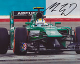 MARCUS ERICSSON SIGNED CATERHAM FORMULA 1 8X10 PHOTO