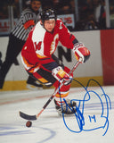 THEO FLEURY SIGNED CALGARY FLAMES 8X10 PHOTO