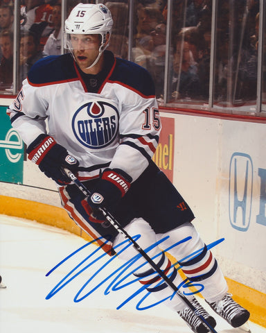 NICK SCHULTZ SIGNED EDMONTON OILERS 8X10 PHOTO